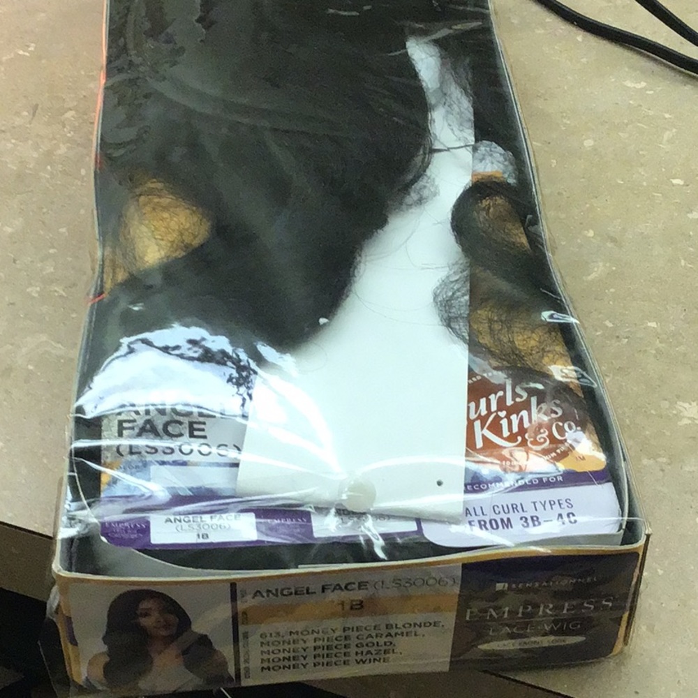 textured lace wig brand-new never been worn still in packet